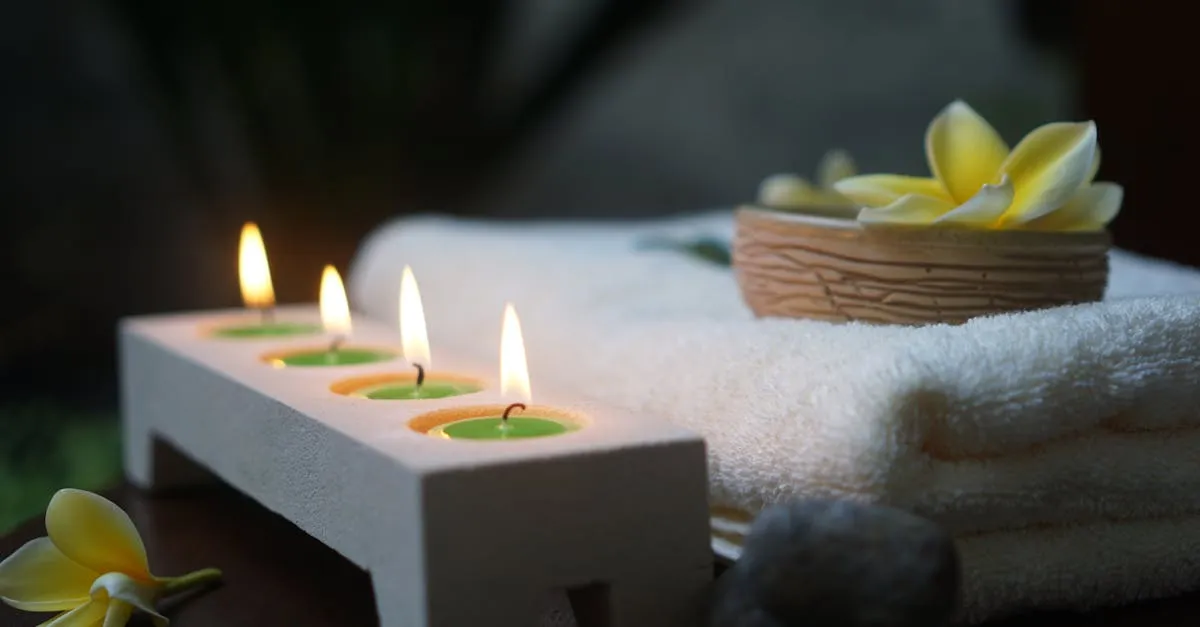 A calm, candle-lit spa setting with soft towels and flowers